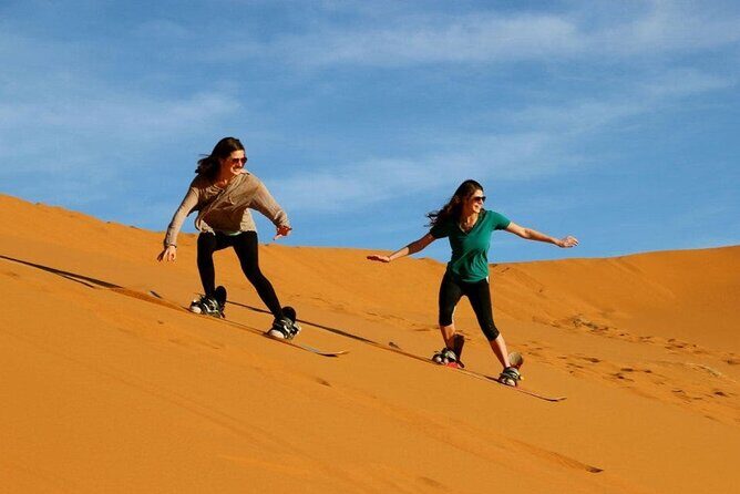Private Evening Red Sand Desert Safari with BBQ Dinner - BBQ Dinner with Belly Dance, Tanura, and a Fire Show
