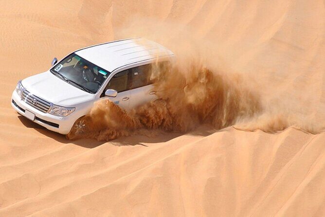 Red Dunes Desert Safari with 4x4 Pick up & Drop, Camel ride, BBQ and Live shows - Dinner BBQ: Veg and Non-Veg Buffet Plus Unlimited Drinks