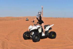 Sunset Desert Safari Quad bike Camel ride Sand Board & BBQ Dinner - Quad biking at Al Lahbab: the highlight that sets the tone