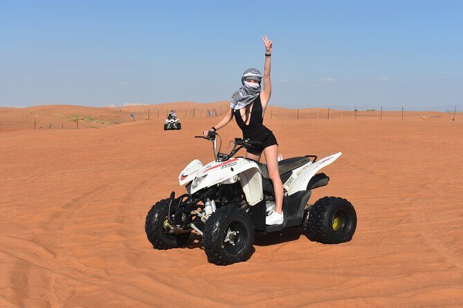 Sunset Desert Safari Quad bike Camel ride Sand Board & BBQ Dinner - Quad biking at Al Lahbab: the highlight that sets the tone